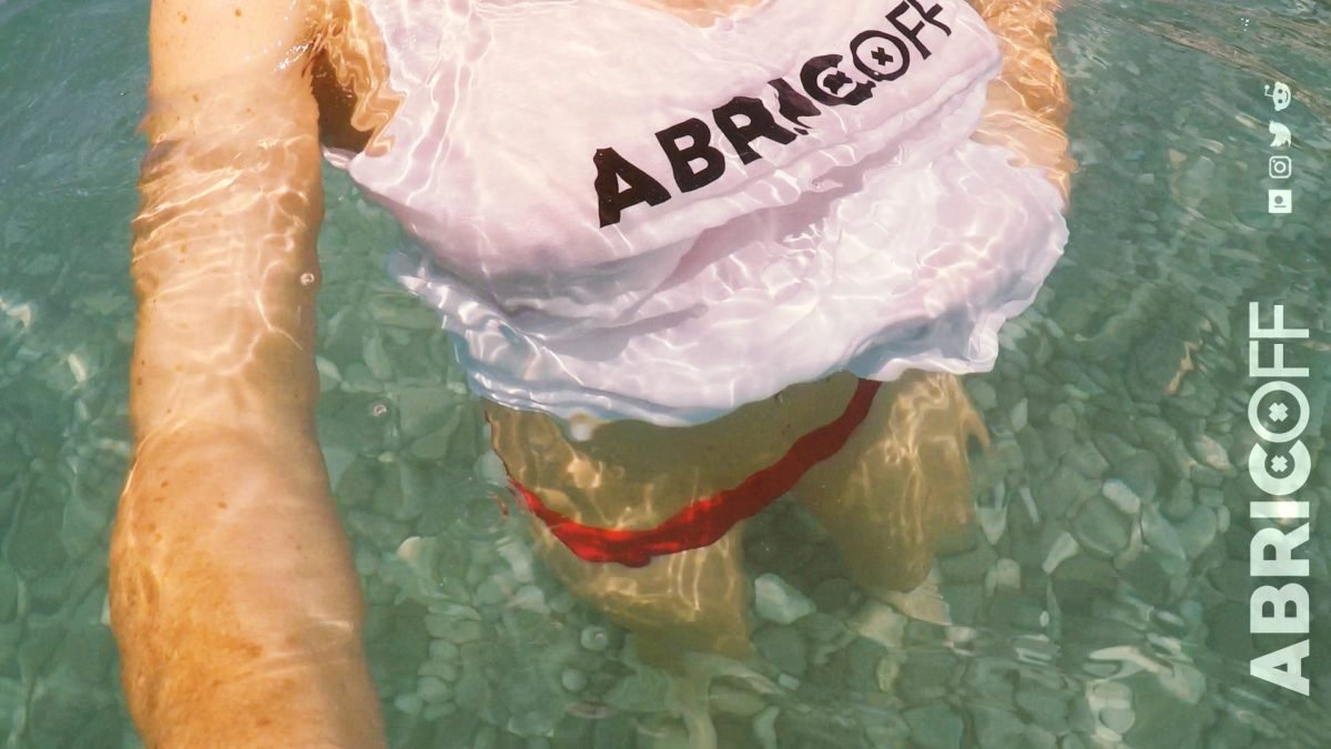 Wet t-shirt in the sea
